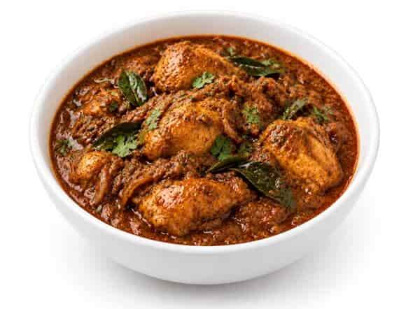 Nadan Chicken Curry traditional Kerala homestyle bursting rustic spices