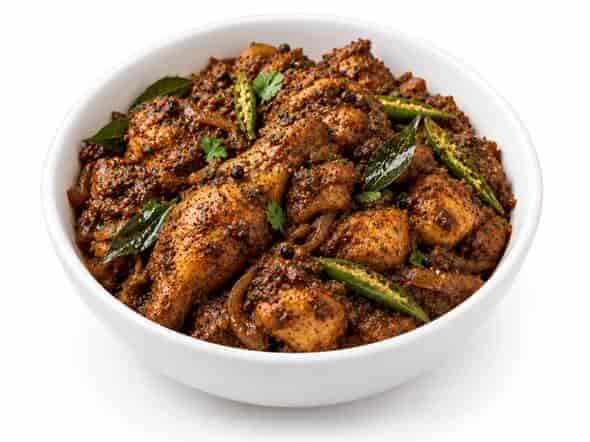 Pepper Chicken Fry intensely spiced dry roasted chunks coated