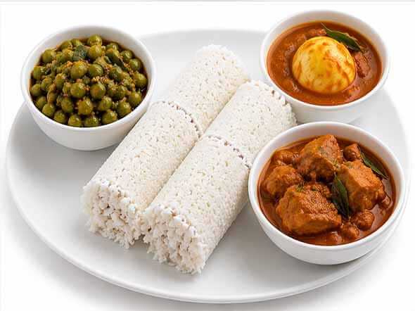 Puttu steamed rice coconut cake Kerala breakfast